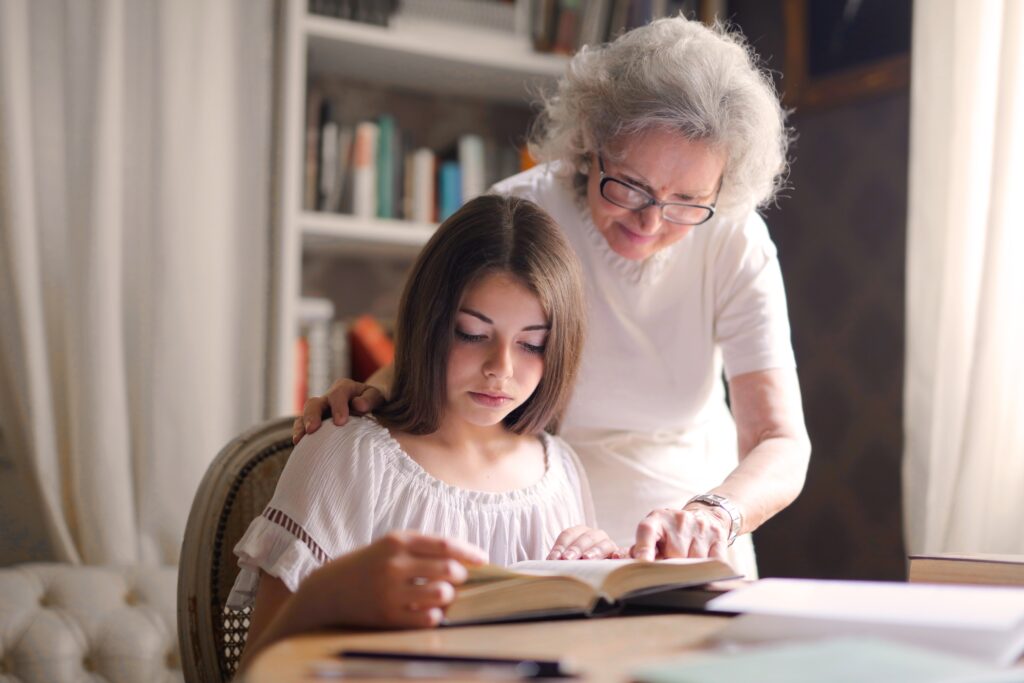Grandmother and Granddaughter studying